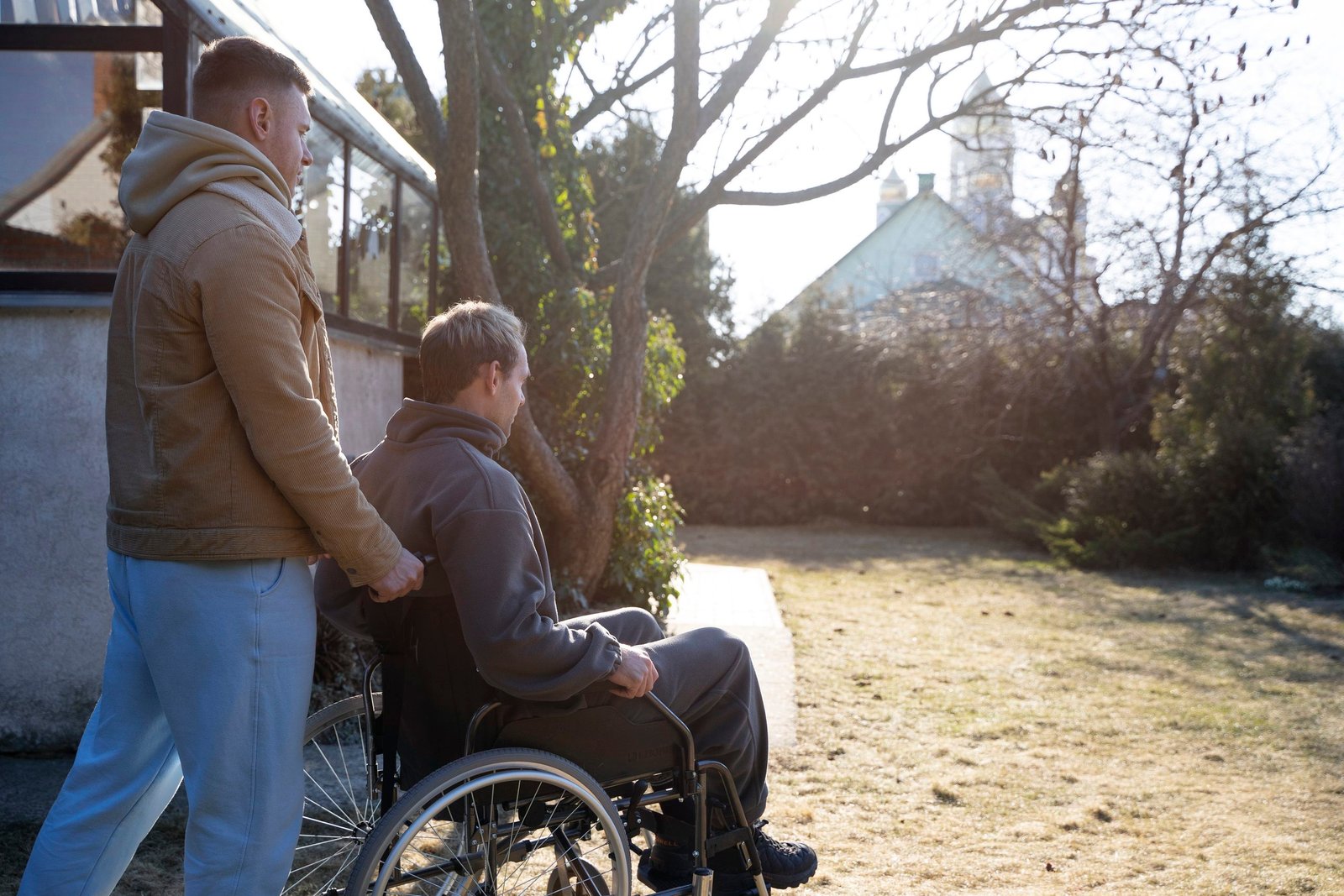 Home medium shot friend helping disabled man